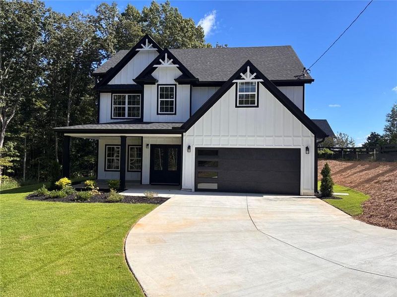Front exterior of a new home in , Gainesville, GA, highlighting curb appeal (Image 4). Front exterior of a new home in , Gainesville, GA, highlighting curb appeal (Image 4).