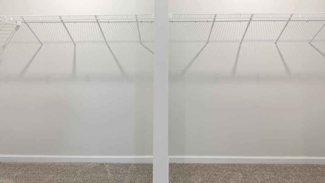 Representative unfurnished interior of a home built from the TILLMAN by D.R. Horton in Surfside Landing, Hubert (Image 33).