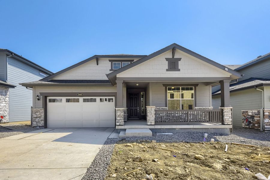 Front exterior of a new home in Red Rocks Ranch, Morrison, CO, highlighting curb appeal (Image 1). Front exterior of a new home in Red Rocks Ranch, Morrison, CO, highlighting curb appeal (Image 1).