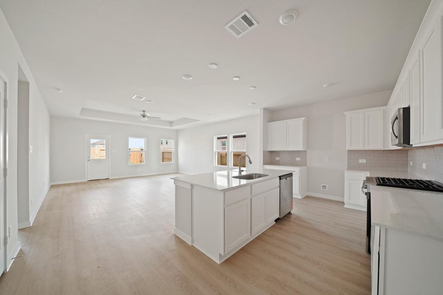 Furnished interior view inside a new home in Sunterra, Katy (Image 3). Furnished interior view inside a new home in Sunterra, Katy (Image 3).