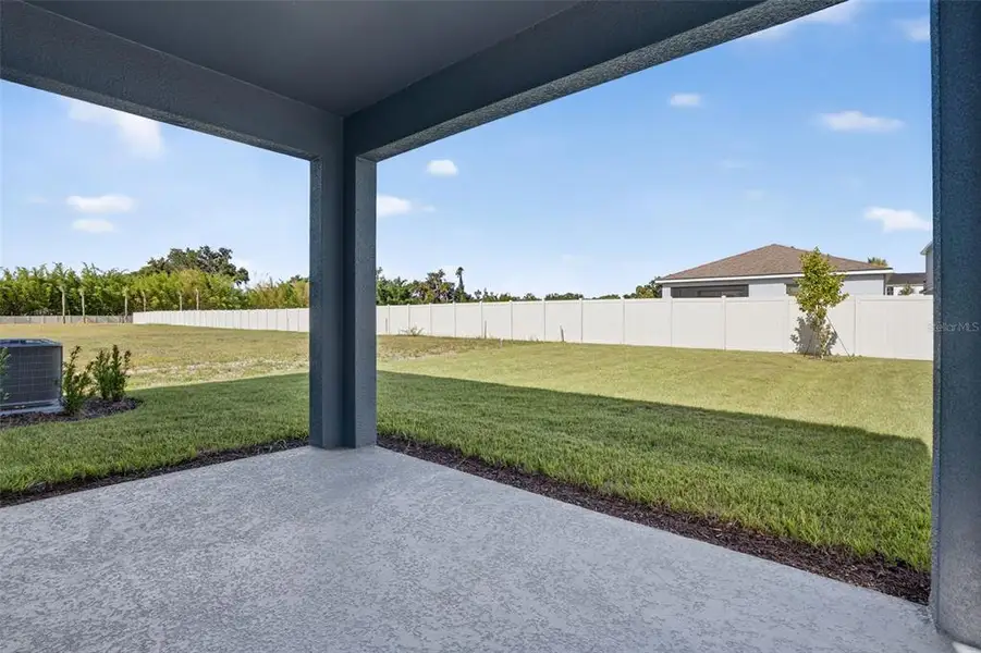 Exterior details and patio area of a home in Sanderling, Palmetto (Image 3).