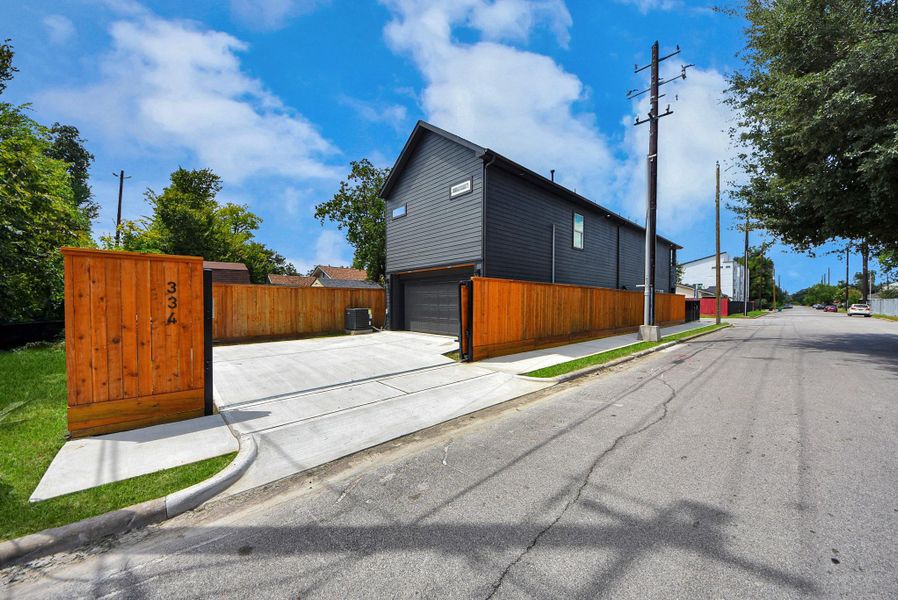 Front exterior of a new home in , Houston, TX, highlighting curb appeal (Image 22).