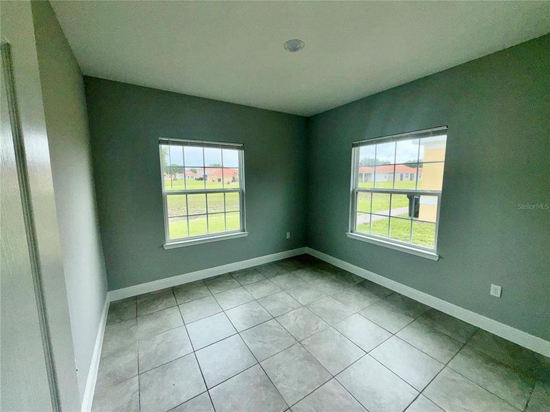 Spacious, unfurnished interior of a new home in Tuscany Preserve, Kissimmee (Image 7).