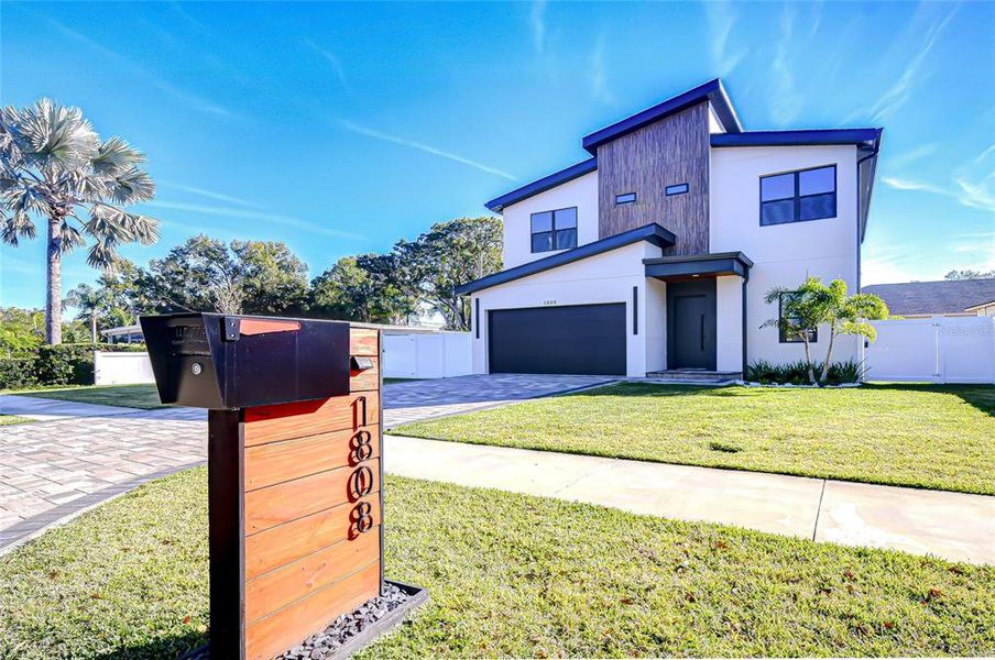 Front exterior of a new home in , Tampa, FL, highlighting curb appeal (Image 29).