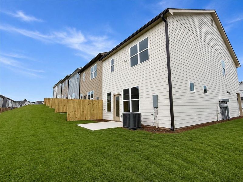 Exterior details and patio area of a home in Somerset at Riverbrook, Gainesville (Image 3).