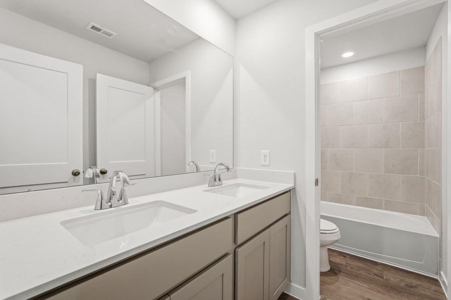 Furnished interior view inside a new home in Sanford Farms, Waller (Image 10). Furnished interior view inside a new home in Sanford Farms, Waller (Image 10).