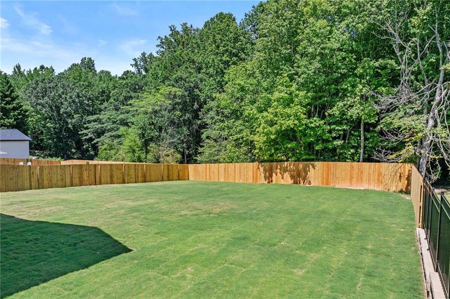 Front exterior of a new home in , Buford, GA, highlighting curb appeal (Image 23). Front exterior of a new home in , Buford, GA, highlighting curb appeal (Image 23).