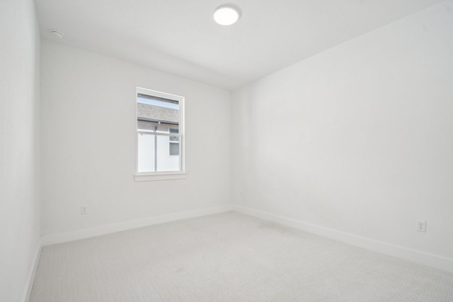 Spacious, unfurnished interior of a new home in Koenig Townhomes, Austin (Image 19).