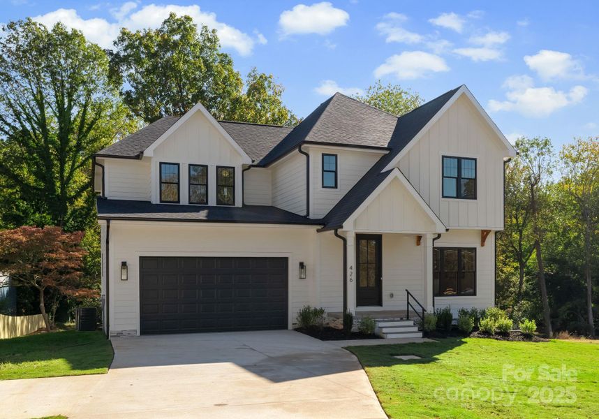 Front exterior of a new home in , Mooresville, NC, highlighting curb appeal (Image 1).