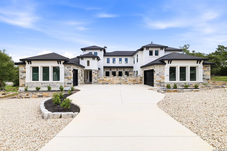 Front exterior of a new home in , New Braunfels, TX, highlighting curb appeal (Image 31).