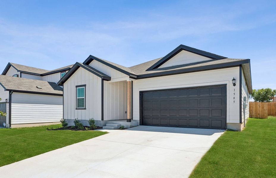 Front exterior of a new home in Skyview, Belton, TX, highlighting curb appeal (Image 18). Front exterior of a new home in Skyview, Belton, TX, highlighting curb appeal (Image 18).
