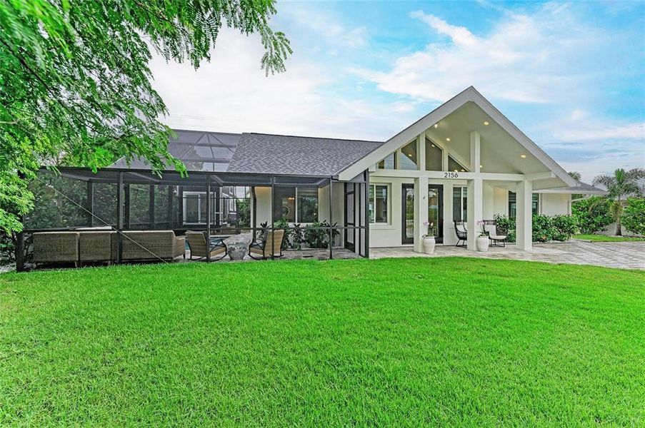 Front exterior of a new home in , Sarasota, FL, highlighting curb appeal (Image 20). Front exterior of a new home in , Sarasota, FL, highlighting curb appeal (Image 20).