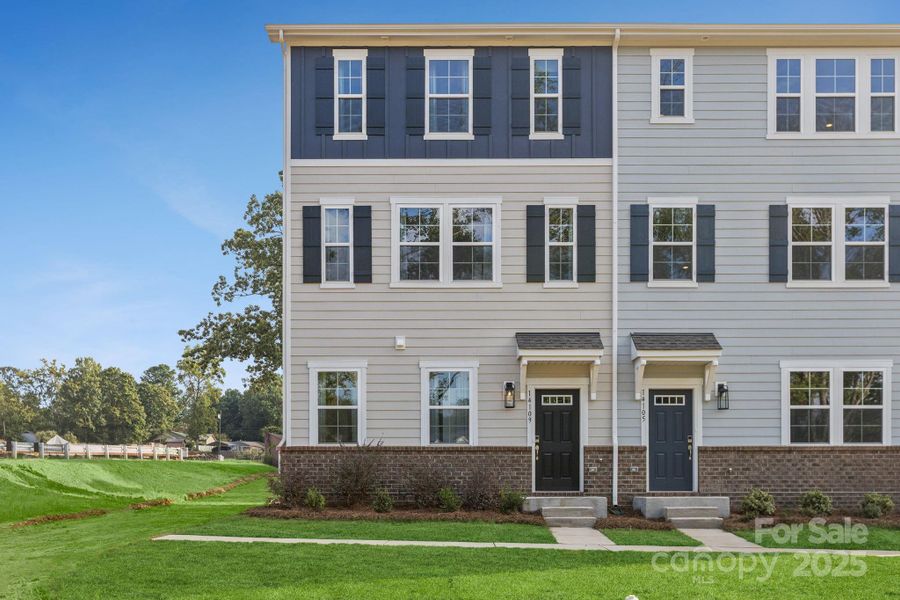 Front exterior of a new home in , Huntersville, NC, highlighting curb appeal (Image 2).