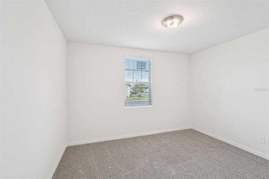 Spacious, unfurnished interior of a new home in Crosswinds - Signature Series, Haines City (Image 24).