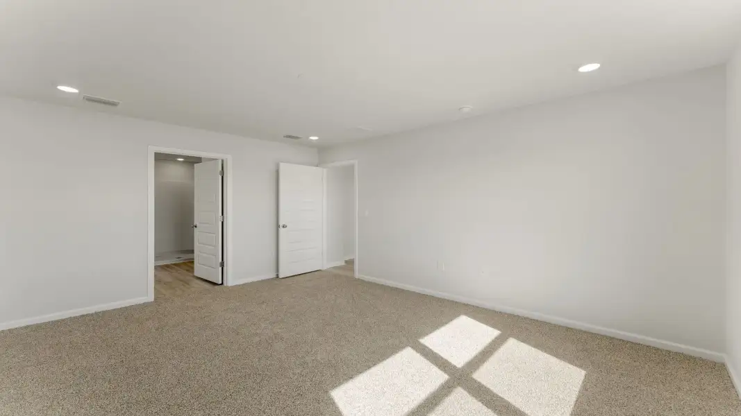 Spacious, unfurnished interior of a new home in Magnolia at the Bluffs Phase 3, Freeport (Image 18). Spacious, unfurnished interior of a new home in Magnolia at the Bluffs Phase 3, Freeport (Image 18).