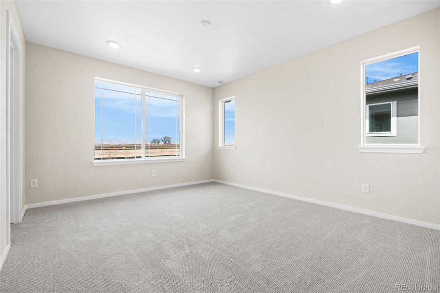 Spacious, unfurnished interior of a new home in Barefoot Village, Firestone (Image 25).