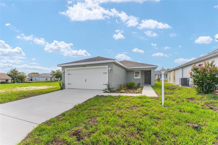 Front exterior of a new home in , Floral City, FL, highlighting curb appeal (Image 27).