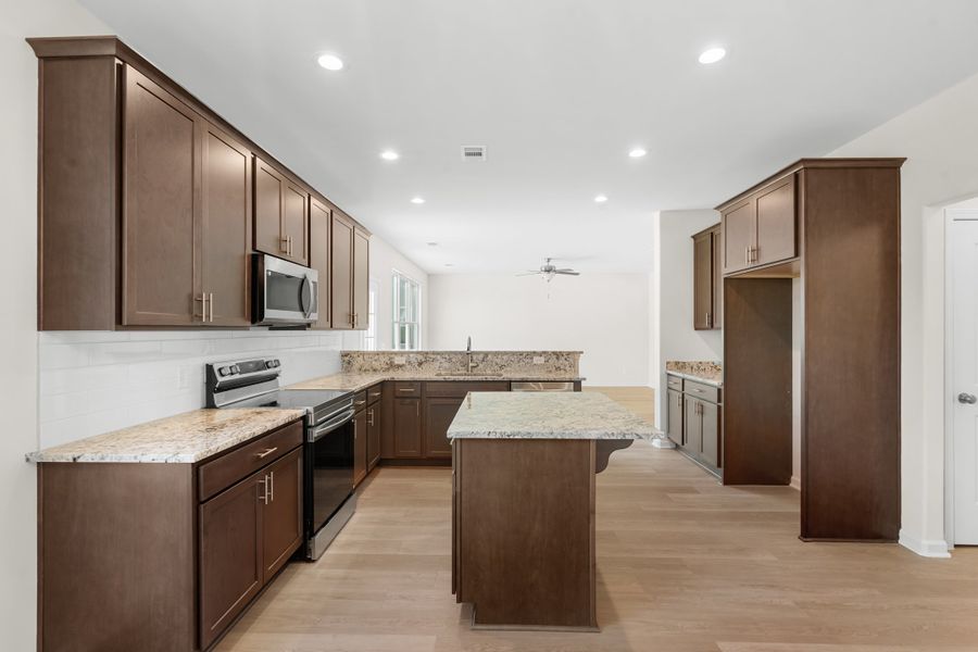 Representative furnished interior of a home built from the The Dalton by Smith Family Homes in Ramsey Landing, Rincon (Image 6).