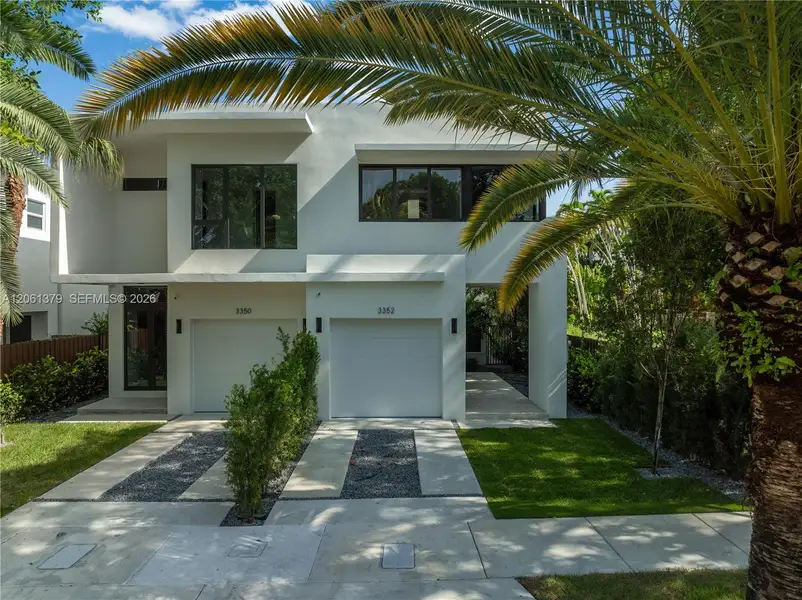 Front exterior of a new home in , Miami, FL, highlighting curb appeal (Image 2). Front exterior of a new home in , Miami, FL, highlighting curb appeal (Image 2).