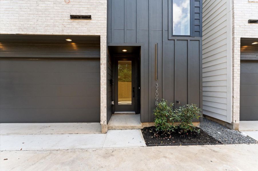 A sleek modern facade complemented by a timeless brick finish A sleek modern facade complemented by a timeless brick finish