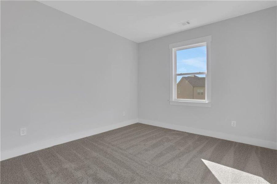 Spacious, unfurnished interior of a new home in Cambridge, Flowery Branch (Image 40).