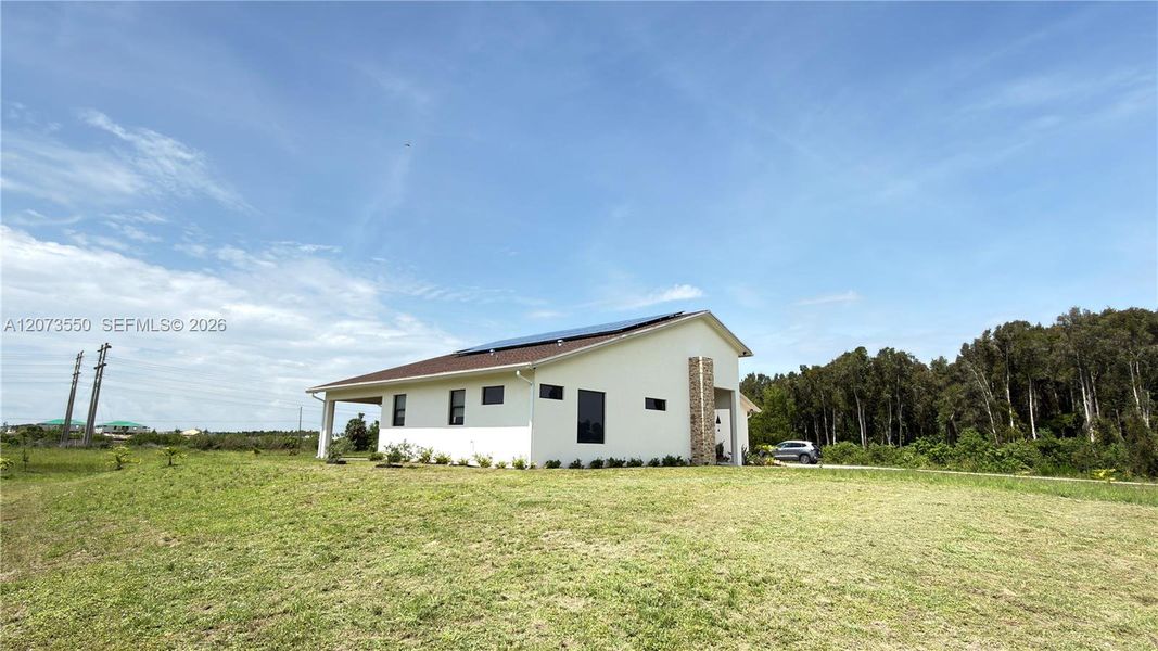 Exterior details and patio area of a home in , Loxahatchee (Image 32).