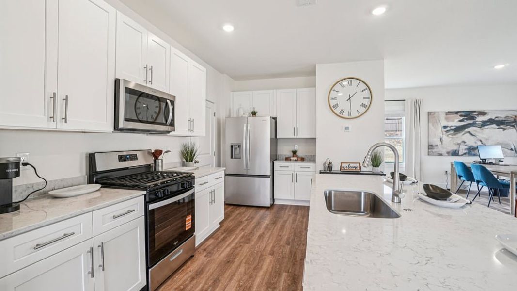Furnished interior view inside a new home in The Hideaway at Fox Meadows, Bluff City (Image 12).
