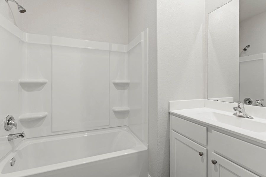 Furnished interior view inside a new home in Canterra Creek, Iowa Colony (Image 6).