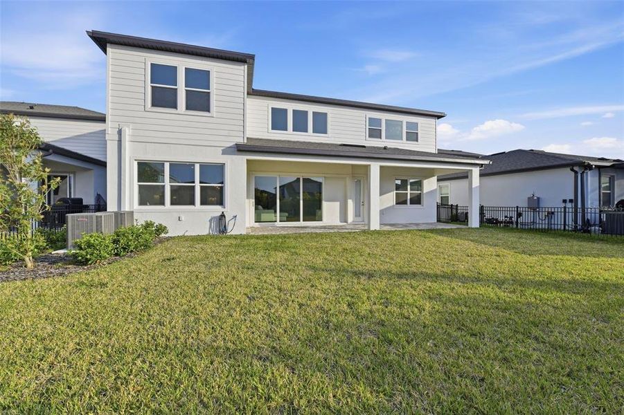 Exterior details and patio area of a home in Waterset, Apollo Beach (Image 3).