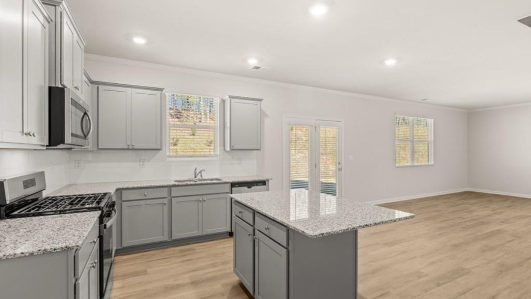 Furnished interior view inside a new home in Northwoods at Mirror Lake, Villa Rica (Image 3).