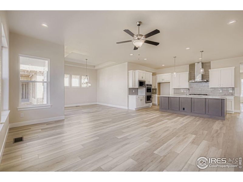 Spacious, unfurnished interior of a new home in RainDance National 60/70, Windsor (Image 24).