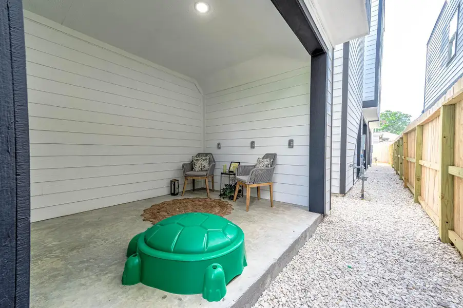 Exterior details and patio area of a home in , Houston (Image 2). Exterior details and patio area of a home in , Houston (Image 2).