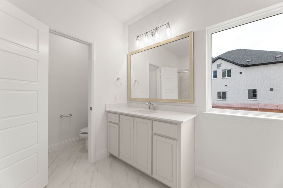 Furnished interior view inside a new home in Creekview Meadows, Pilot Point (Image 9).