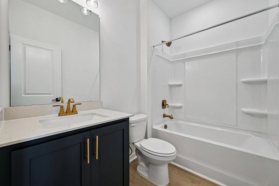 Bath 2 featuring the AW Collection® Sapphire - Clean lines and layered design pop with color. Bath 2 featuring the AW Collection® Sapphire - Clean lines and layered design pop with color.