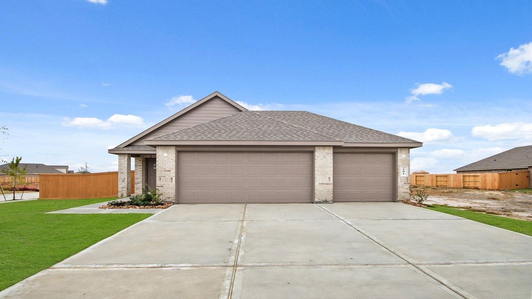 Front exterior of a new home in River Ranch Meadows, Dayton, TX, highlighting curb appeal (Image 17).