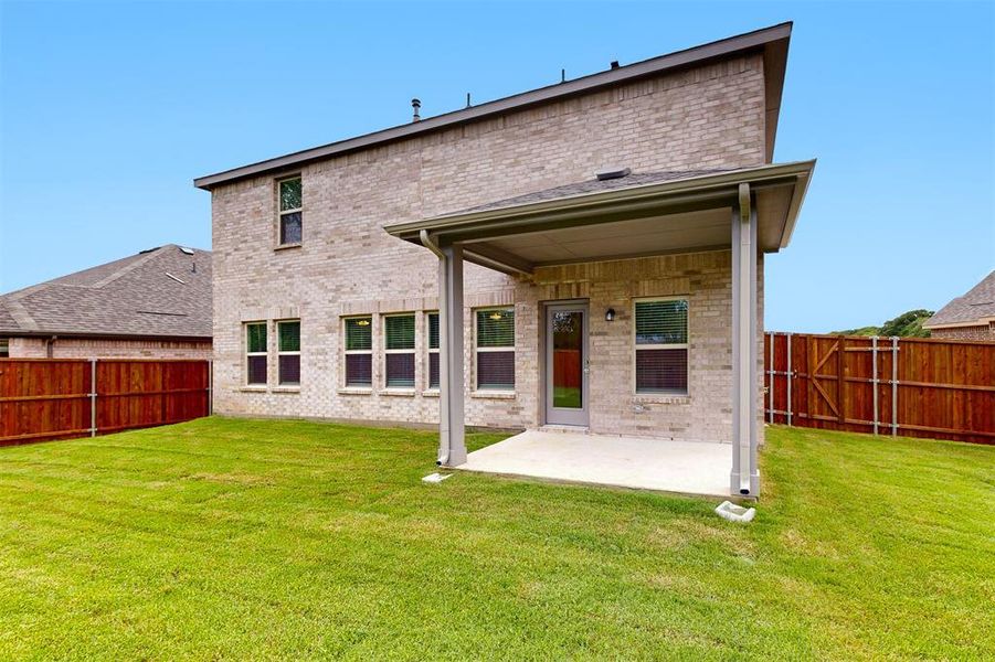 Front exterior of a new home in Kings Way, Denton, TX, highlighting curb appeal (Image 1). Front exterior of a new home in Kings Way, Denton, TX, highlighting curb appeal (Image 1).
