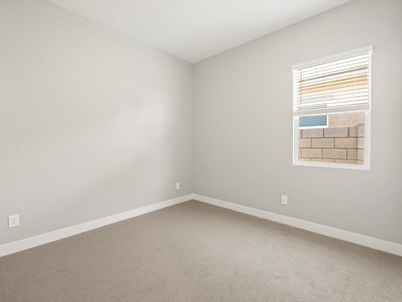 Spacious, unfurnished interior of a new home in White Tank Foothills Reserve Series, Waddell (Image 20).