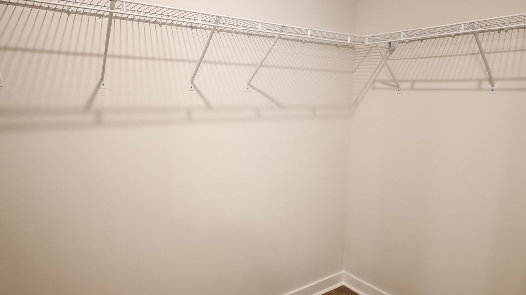 Representative unfurnished interior of a home built from the STONEBROOK II by D.R. Horton in Harvest Point, Spring Hill (Image 43).