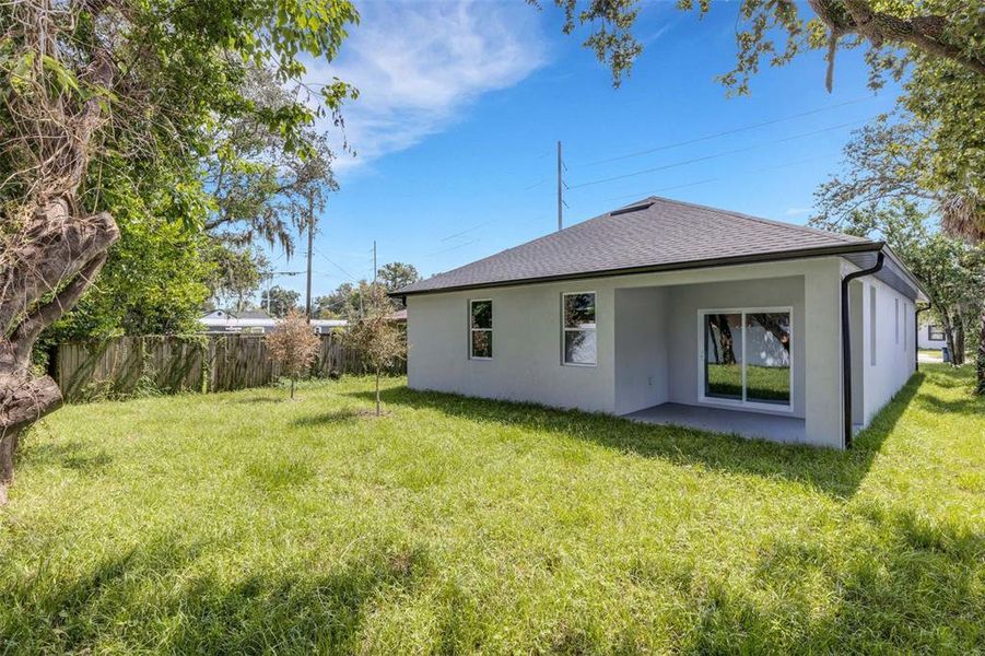 Front exterior of a new home in , Tampa, FL, highlighting curb appeal (Image 25).