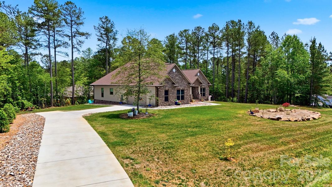Front exterior of a new home in , Connelly Springs, NC, highlighting curb appeal (Image 20). Front exterior of a new home in , Connelly Springs, NC, highlighting curb appeal (Image 20).