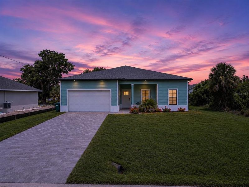 Front exterior of a new home in , Port Charlotte, FL, highlighting curb appeal (Image 24).