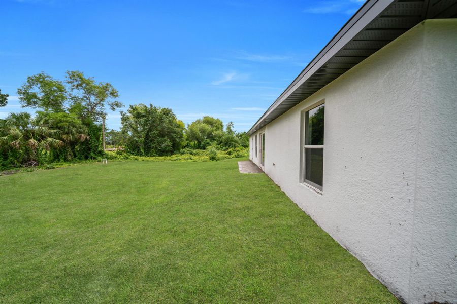 Exterior details and patio area of a home in , Lehigh Acres (Image 3). Exterior details and patio area of a home in , Lehigh Acres (Image 3).