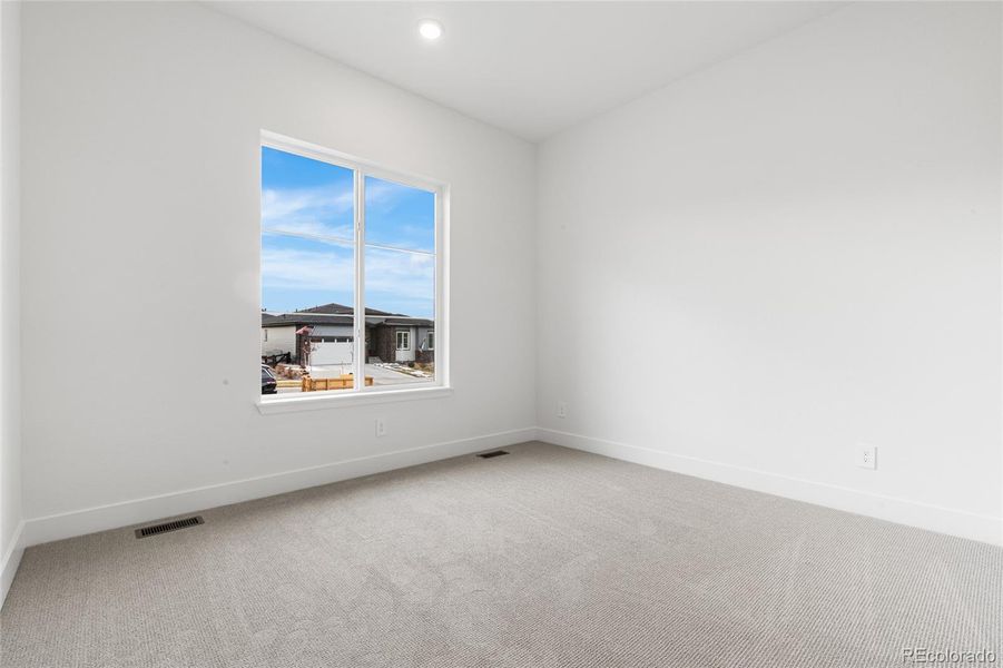 Spacious, unfurnished interior of a new home in Hilltop at Inspiration, Aurora (Image 19).