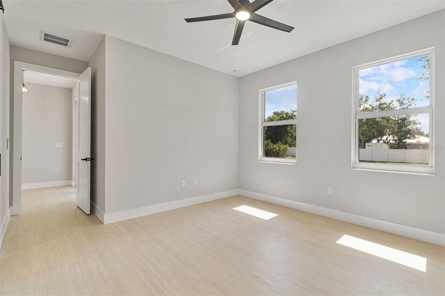 Spacious, unfurnished interior of a new home in , Port Charlotte (Image 35).