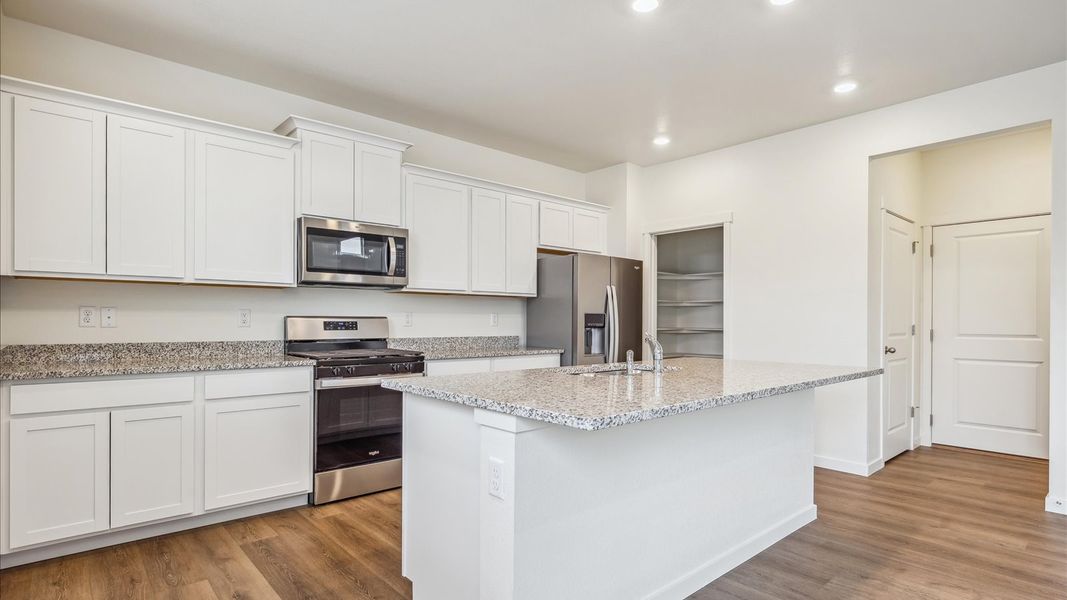 Furnished interior view inside a new home in Settlers Crossing, Commerce City (Image 6).