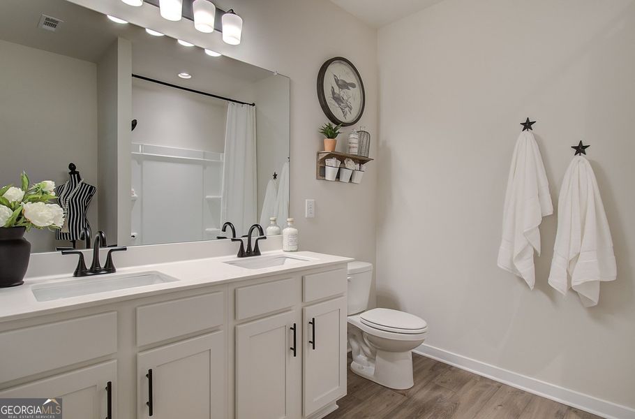 Furnished interior view inside a new home in Rosewood Lake Estates, Hoschton (Image 58).