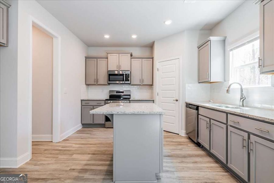 Furnished interior view inside a new home in Carson's Walk, Macon (Image 4).