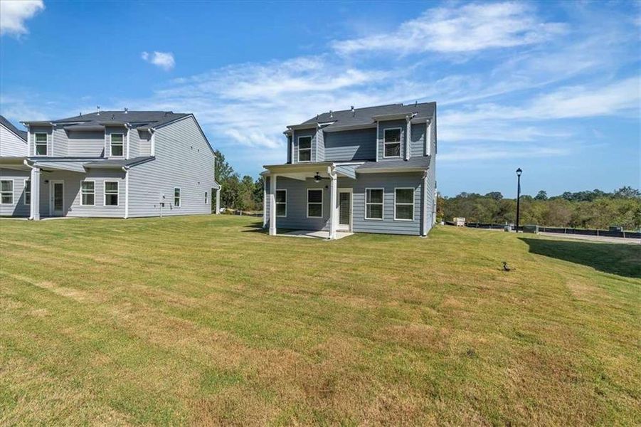 Exterior details and patio area of a home in The View at Groover's Lake, Lithia Springs (Image 22). Exterior details and patio area of a home in The View at Groover's Lake, Lithia Springs (Image 22).