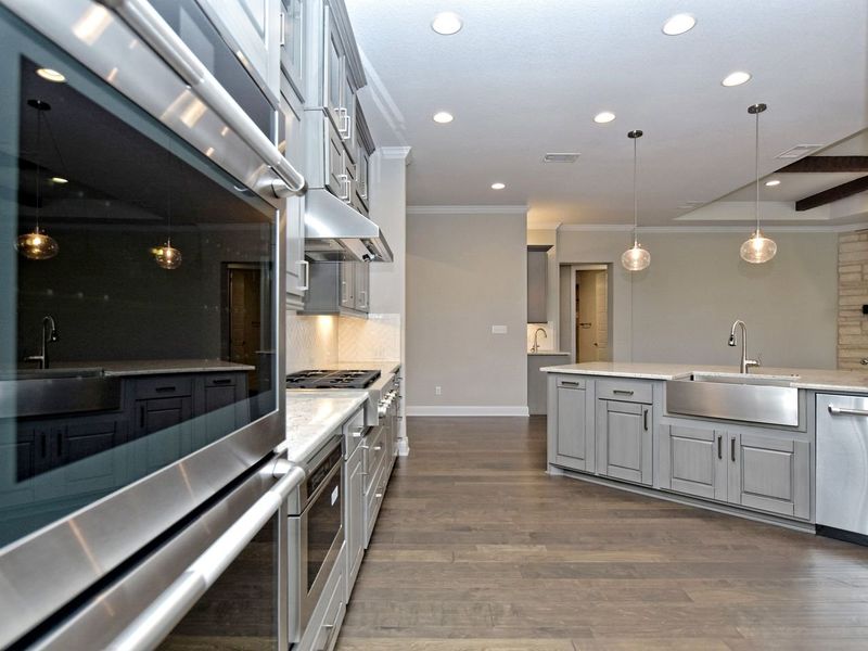 Representative furnished interior of a home built from the Madera II by Giddens Homes in Scofield Farms Estates, Georgetown (Image 176).