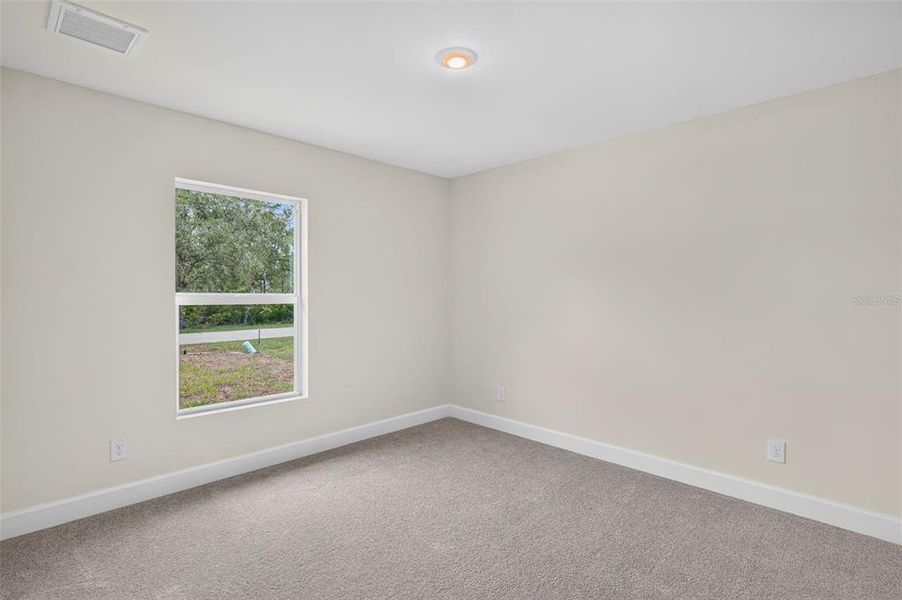 Spacious, unfurnished interior of a new home in , Port Charlotte (Image 13).